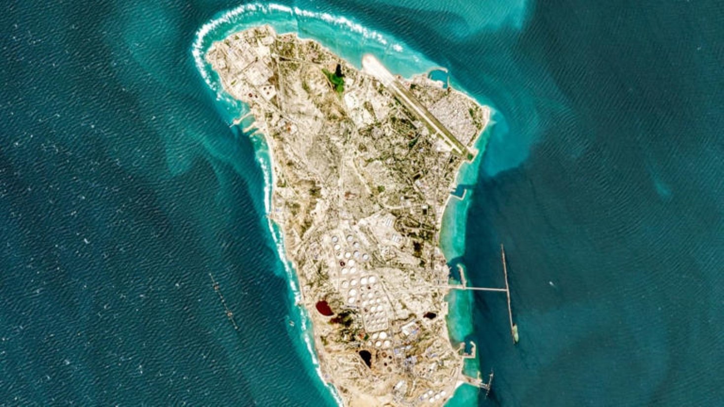 SamacharToday.co.in - ट्रम्प ने 'रेड लाइन' पार की खर्ग द्वीप के सैन्य ठिकानों को किया तबाह - Image Crdited by Moneycontrol